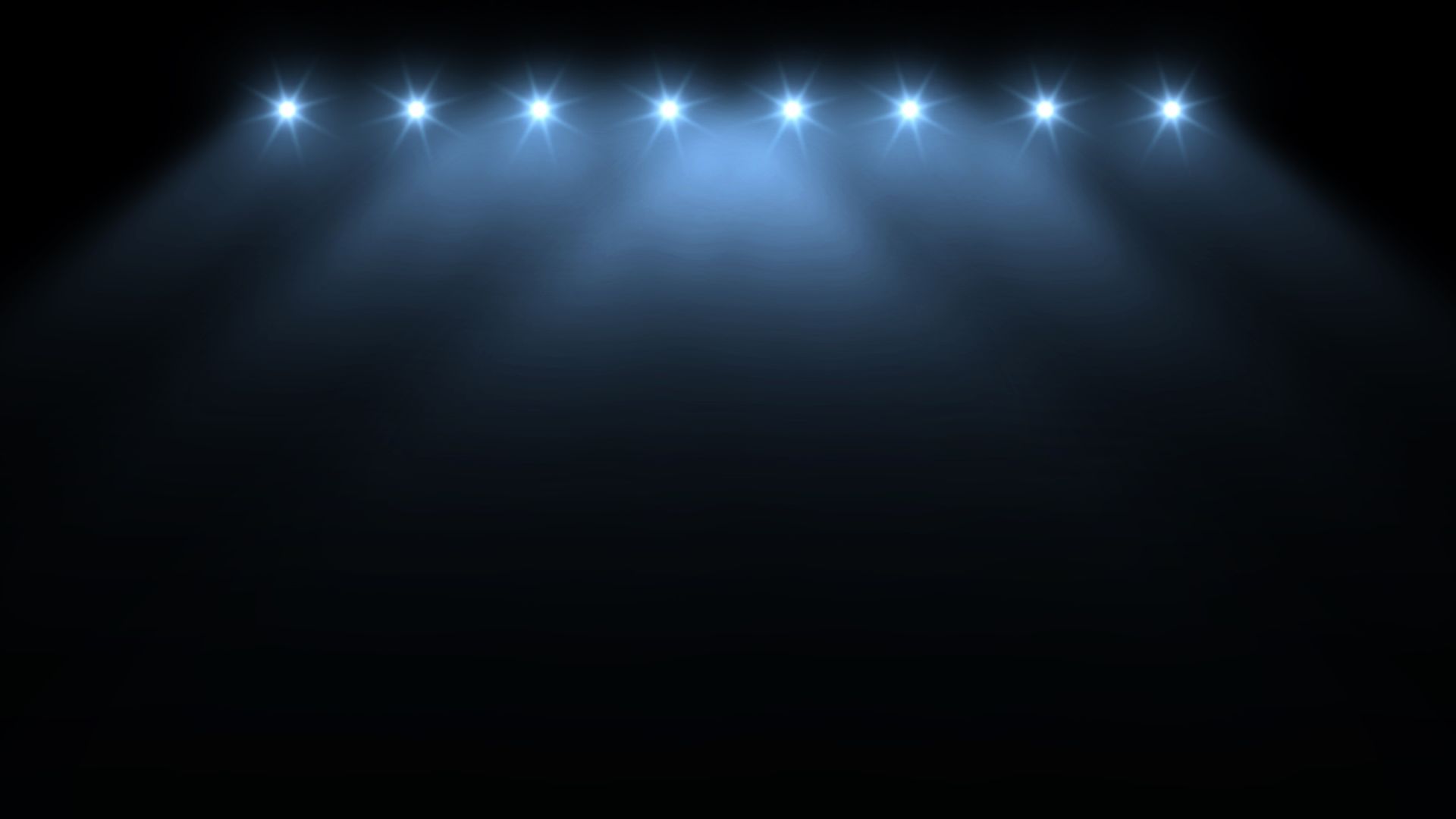 image of spotlights on dark stage